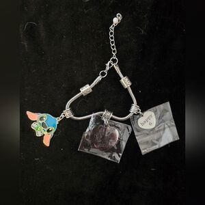 Silver Stich Themed Charm  Bracelet With 2 Additional Charms